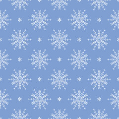 Fototapeta premium Seamless winter pattern featuring blue snowflakes on a white background. Minimalist festive design ideal for Christmas wrapping paper, holiday cards, textiles, and seasonal decorations