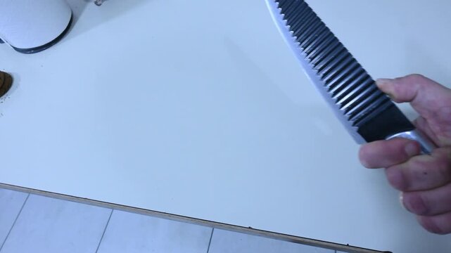 Person Picking Up a Knife by Hand &mdash; Close-Up 4