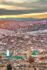 Fototapeta premium Morocco, the Medina of Fes el Bali, aerial view of the old town at the first light of dawn