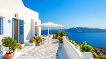 Fototapeta premium Santorini island balcony overlooking the deep blue aegean sea