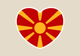 Obraz premium North Macedonia flag heart vector icon symbolizing patriotic love and national pride for the European country.