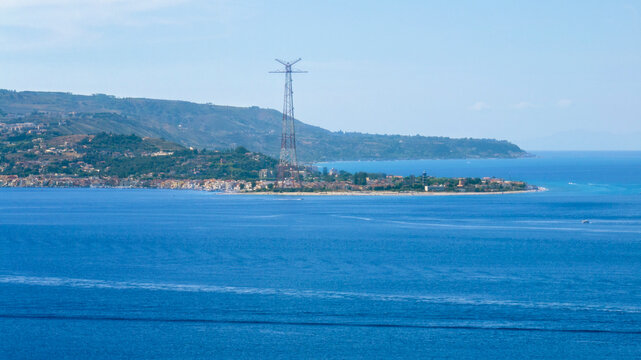 Aerial view of the Torre Faro pylon, marking the easternmost point of Sicily, Italy. It is located at the entrance to the Strait of Messina.