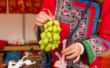 Chinese New Year candle workshop - create traditional festive symbols and Chinese characters from red paper. Cultural craft activity celebrating Lunar New Year traditions