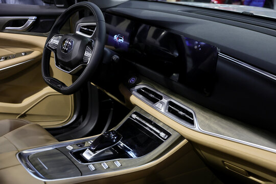 Inside of DSFK E 5 plug-in hybrid (PHEV) mid-size SUV. Photographed in ambiental light. Romania, Bucharest, October 2025.
