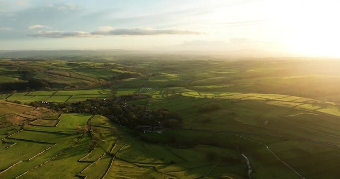 Flying over green valley in Yorkshire Dales