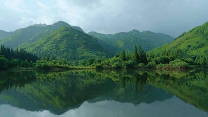 Lush Green Mountains Reflected in Calm Lake