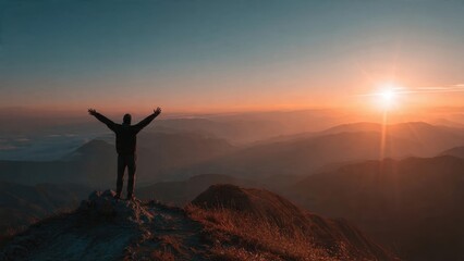 Man on Mountain Top at Sunrise