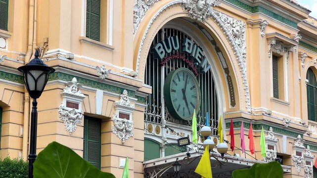 Vietnam, September 9, 2025: The Central Post Office in Ho Chi Minh City. Gorgeous glass windows and arches. An old building built in the neo-Gothic style. Saigon. 4К