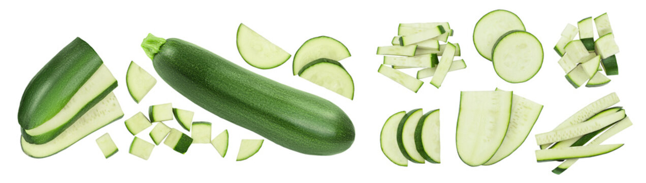 Fresh sliced zucchini isolated on white background. Top view with copy space for your text. Flat lay