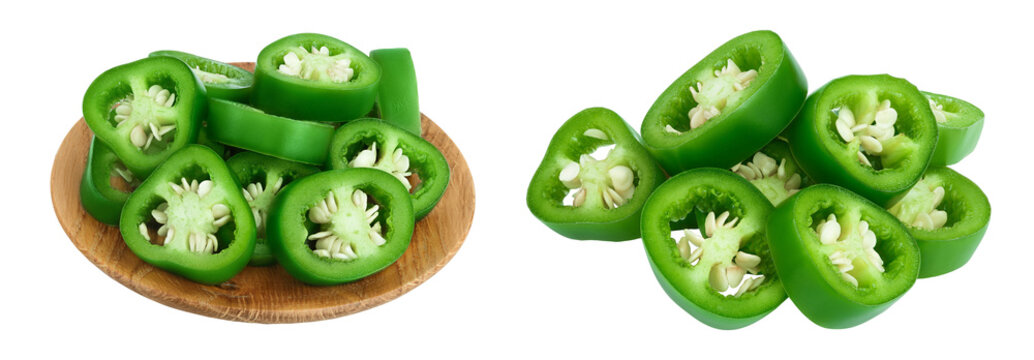 sliced jalapeno pepper in wooden bowl isolated on white background. Green chili pepper with full depth of field.