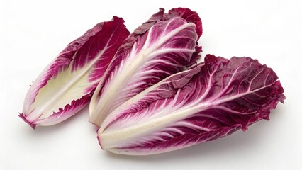 Radicchio vegetables displayed on a white background showcasing vibrant red and white coloration