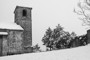The Espiritu Santo church in Riopar Viejo, the beautiful medieval town on a snowy day