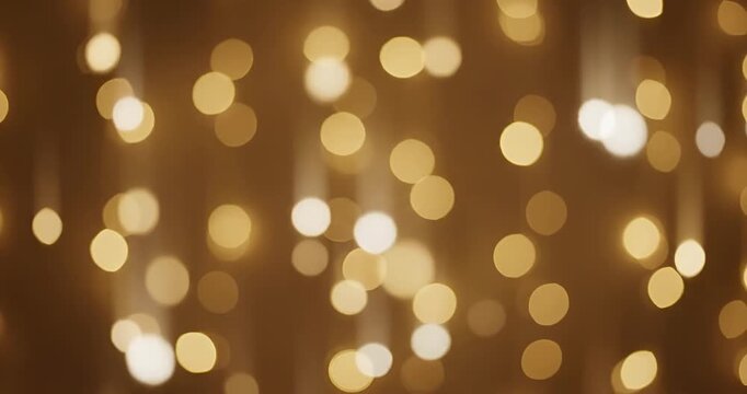 Abstract golden blurred bokeh lights holiday background