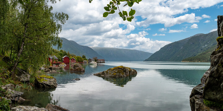 Old boathouses at the harbor of Solvorn village