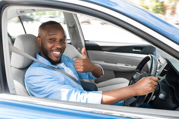 Great Car. Happy African American Man Showing Thumbs Up Sign Gesture, Sitting In New Automobile...