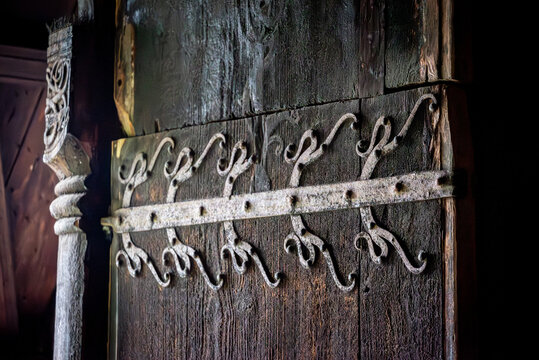 Medieval cast iron hinge at the entrance to the stave church of Ornes