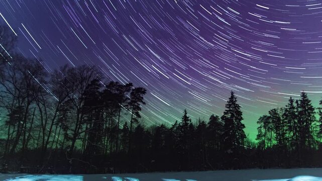 Startails and northern lights - 4k timelapse landscape.