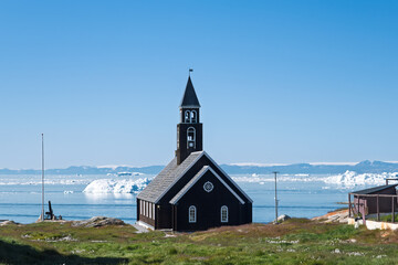 Zion Church (Zions Kirke) in Ilulissat Overlooking the Icefjord, Greenland © Michel