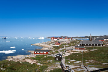 Colorful Wooden Houses and Arctic Architecture in Ilulissat, Greenland © Michel