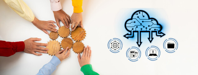 A dynamic teamwork scene showcasing hands collaborating with wooden gears and cloud technology...