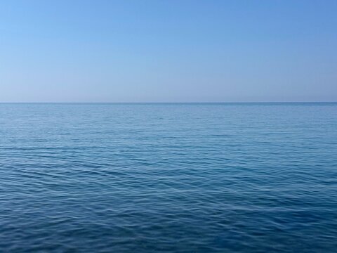 Calm blue sea and clear sky.