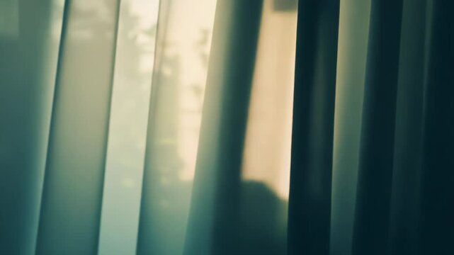 Diffused sunlight softly illuminating translucent and opaque curtains, creating a tranquil atmosphere in a room with blurred green foliage visible outside