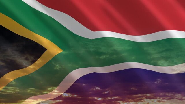 Flag of South Africa waving against a vibrant sunset, creating a patriotic and inspiring atmosphere with warm tones.