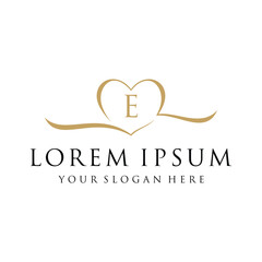 Obraz premium Initial letter E heart love logo design, luxury elegant logo graphic concept