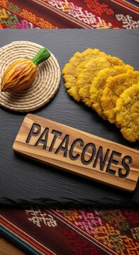 Traditional Ecuadorian Patacones Fried Green Plantains on Black Slate with Otavalo Pano Mat