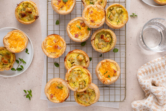 Mini quiches with ham and cheese and chicken and pesto, healthy breakfast or snack idea