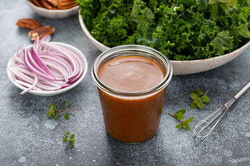 Balsamic vinaigrette salad dressing in a glass jar