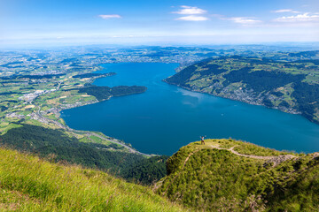 Fototapeta premium Panoramic view from Rigi Kulm of a serene lake Zugersee, Switzerland