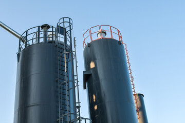 Facilities for storage and production of biogas called silos, digesters and drying towers. © kyrychukvitaliy