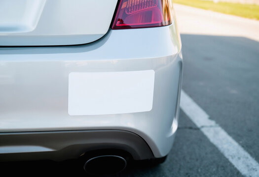 Blank white rectangle sticker on car rear bumper, ai generated