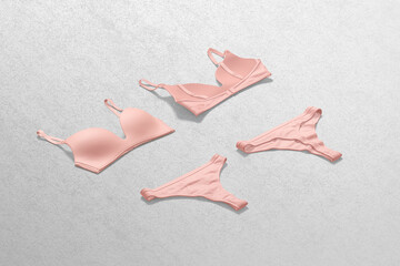 Blank pink lingerie complect bra and thong mockup, side view