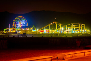 Obraz premium Pacific Park illuminated at night on Santa Monica Pier