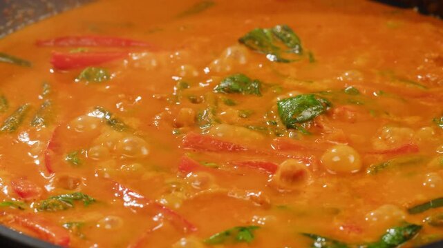 Tamarind red prawn curry cooking, shrimps in tomato ginger sauce, asian kitchen, Chinese restaurant.
