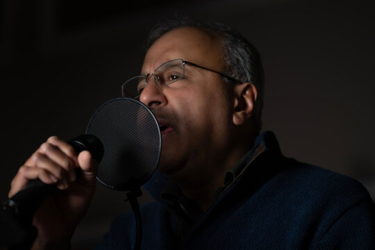 Man singing on a microphone 