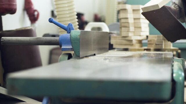 Professional wood finishing process on drum sander machine for handmade wooden cutting board