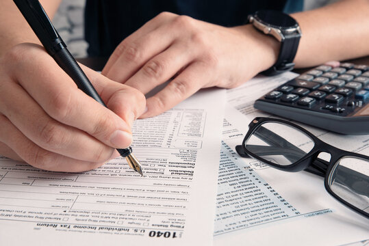 Tax return concept wits US 1040 tax form