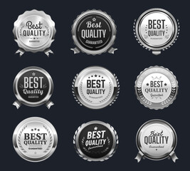 Fototapeta premium Best quality silver labels, badges and tags or award seals with ribbons, vector laurel wreaths. Best quality badges with silver ribbons for premium product and best choice guarantee for shop or store