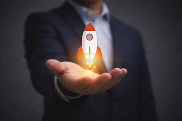 Rocket launching from a cloud on businessman hand for representing new company growth innovation digital strategy entrepreneurship vision and success in modern technology.