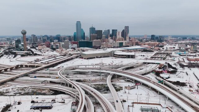 Snow Covered Highways with Dallas City Skyline