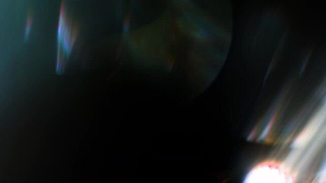 Real Shooted Cinematic Lens Flare Overlay on Black Background at 1000fps Slow Motion.
