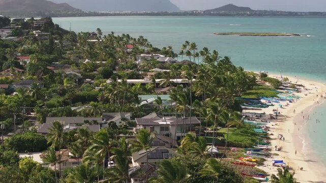Beautiful houses neighborhood by the Lanikai beach on a sunny day drone video, Oahu, hawaii 4K