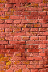 Peeled and weathered red brick texture  