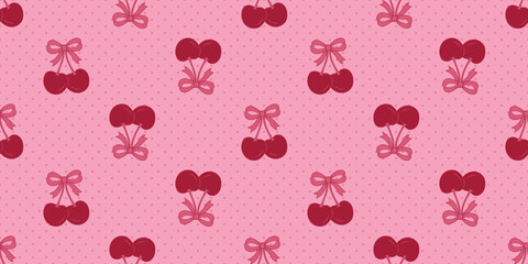 Seamless pattern of cherries with pink bows on a pink polka dot background, perfect for Valentine's Day decoration.