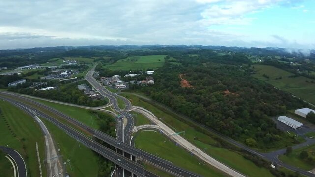 Johnson City, USA Aerial Drone View Complex Highway Interchange, HighAngle Shot Of Multilane Overpasses, Looping Ramps And Elevated Bridges Winding Through Valley Landscape Near Johnson