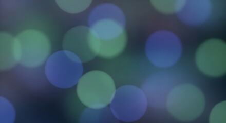 Abstract blue and green bokeh lights background with soft out of focus glowing circles