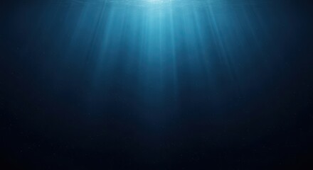 Obraz premium Abstract underwater scene with sunlight beams and dark blue background